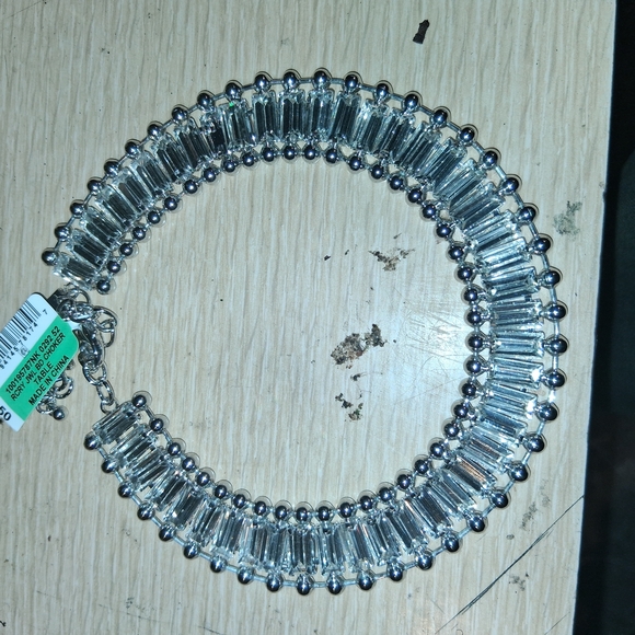 Silver Bracelet with Reflective Segments and Metallic Connectors - Picture 1 of 2